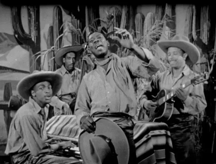 John “Shadrach” Horace and Johnny Moore’s 3 Blazers perform "Along the Navajo Trail" (1945). Photo: courtesy Kino Classics.