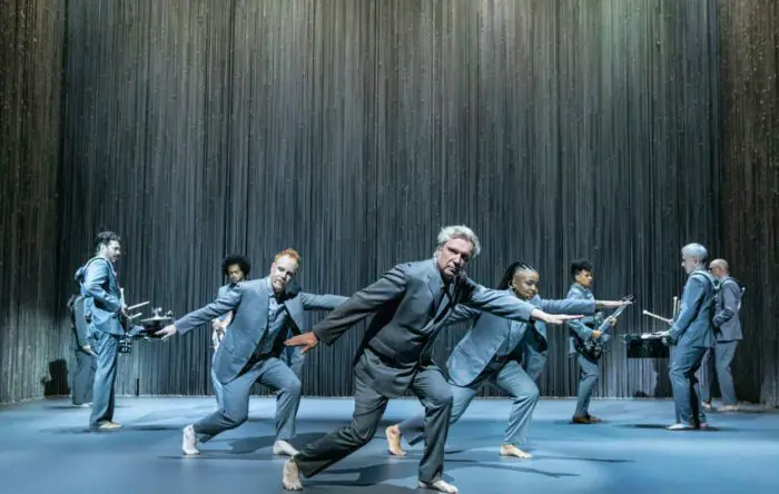 David Byrne and his players and dancers perform in David Byrne's American Utopia. 