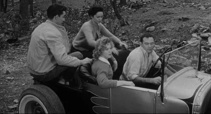 Teens in a car in the 1950s