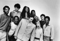 1984: The Talking Heads line-up for the concert film 'Stop Making Sense' (L-R Steve Scales, Bernie Worrell, Jerry Harrison, Ednah Holt, David Byrne, Lynn Mabry, Tina Wemouth, Chris Frantz and Alex Weir) pose for a portrait in 1984. (Photo by Sire Records/Michael Ochs Archives/Getty Images)