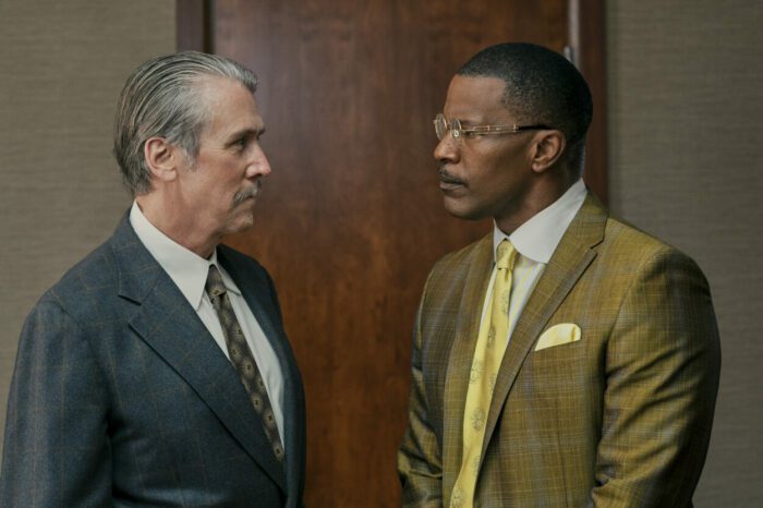 A white lawyer and Black lawyer stare each other down in The Burial