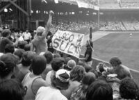 Fan display a banner reading "Disco Sucks" at Disco Demolition Night at Comiskey Park, Chicago Illinois, July 12, 1979.