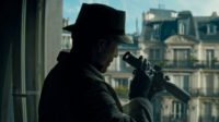 The Killer (Michael Fassbender) scopes out his next target in Paris