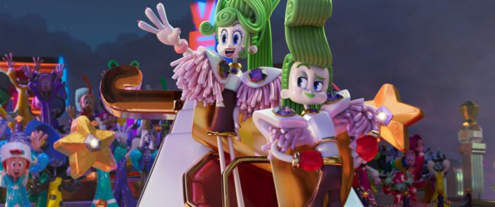 A brother and sister duo of pop stars waves for the crowd in Trolls Band Together