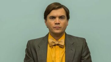 Walden (Emile Hirsch) faces the camera, dressed in a suit and bow tie.