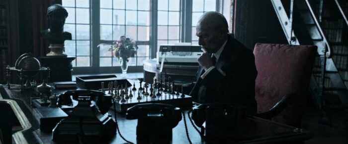 Christopher Plummer in a wide shot medium in All the Money in the World
