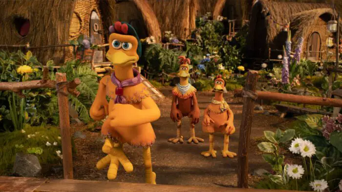 Molly, Rocky, and Ginger voiced by Bella Ramsey, Zachary Levi, and Thandiwe Newton in Chicken Run: Dawn of the Nugget (2023). Courtesy of Netflix. Young Molly running away from her parents as she flees the hidden chicken sanctuary.