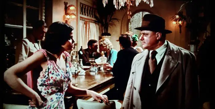 Eileen Brennan and Charles Durning as Billie and Lt. Snyder in The Sting (1973). Police officer Snyder stands in a fancy bar trying to menace Billie. Screen capture off the Universal 100th Anniversary Collectors' Series Blu-ray.