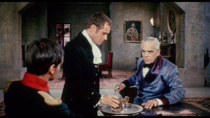 A servant presents a tray to his master (Boris Karloff) in The Terror.