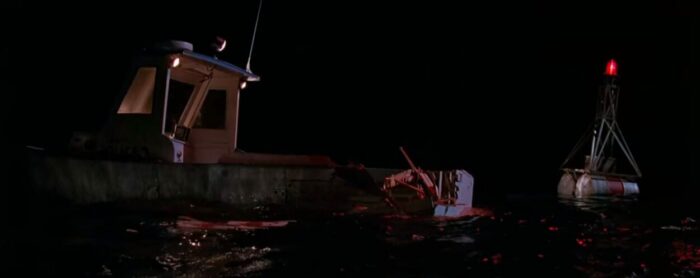 A ruined police boat is shredded by a giant shark in Jaws: The Revenge.