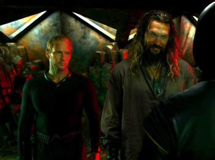 (L-r) PATRICK WILSON and JASON MOMOA as Aquaman in Warner Bros. Pictures’ action adventure “Aquaman and the Lost Kingdom,” a Warner Bros. Pictures release. Aquaman and Orm on a refinery looking smug and ready to fight.