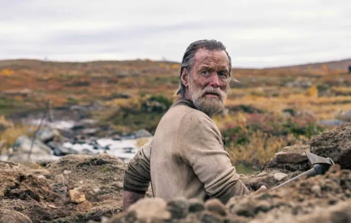 Jorma Tommila as Aatami Korpi in Sisu (2022). Screen capture off Amazon. A grizzled old man with a beard glaring.