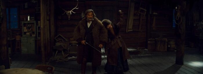 Kurt Russell and Jennifer Jason Leigh in a Wide Shot for The Hateful Eight