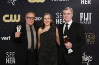 Three producers hold their Critics Choice Awards