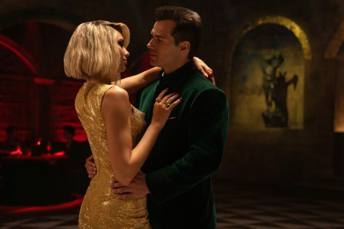 (from left) Lagrange (Dua Lipa) and Argylle (Henry Cavill) in Argylle, directed by Matthew Vaughn. Universal Pictures; Apple Original Films; and MARV. Well-dressed spies Lagrange and Argylle dancing in a dimly lit club.