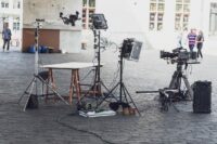 Cameras and lights are waiting on a movie set