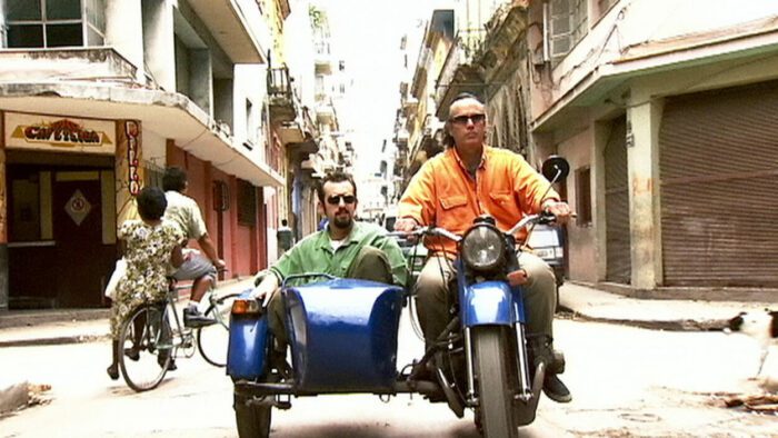 Joachim Cooder and Ry Cooder in ride a motorcycle and sidecar in Buena Vista Social Club (1999)