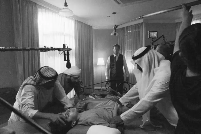 A behind the scenes photo of the shooting of one of Three's exorcism scenes.