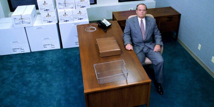 Warren Schmidt (Jack Nicholson) stares blankly in his office in About Schmidt. 