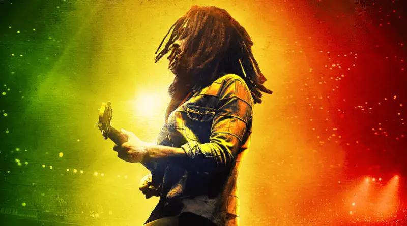 Kinglsey Ben-Adir performing as Bob Marley on the poster for Bob Marley: One Love.