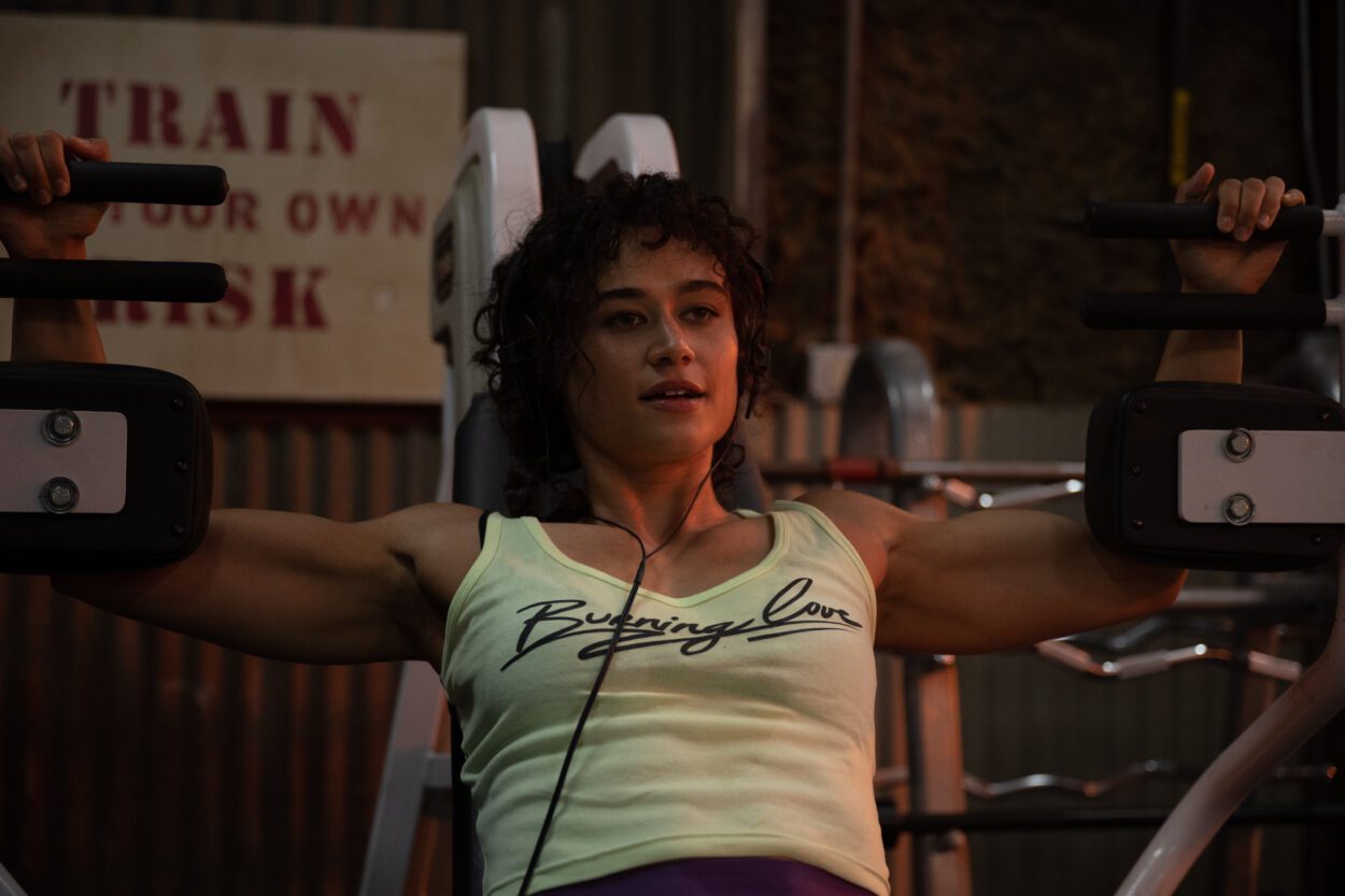 Katy O'Brien as Jackie pumping iron at Crater gym