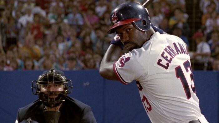 Image from Major League showing an umpire and hitter Pedro Cerrano (Dennis Haysbert) 
