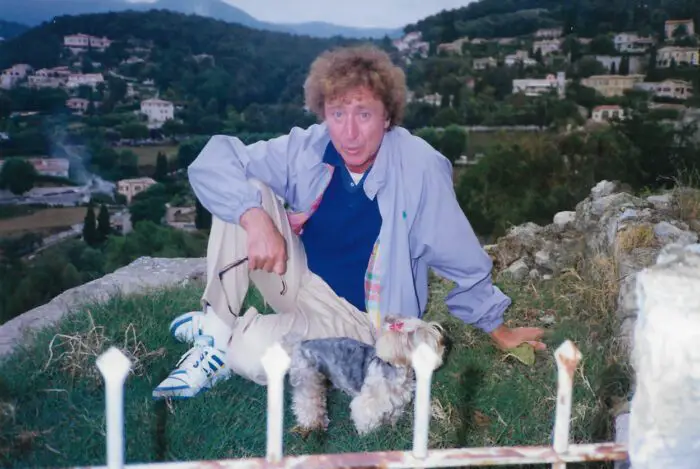 Gene Wilder poses with his pet dog.