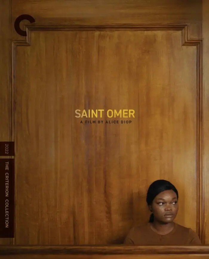 Cover of the Criterion Blu-ray of Saint Omer featuring the character of Laurence Coly (Guslagie Malanda) testifying in court.