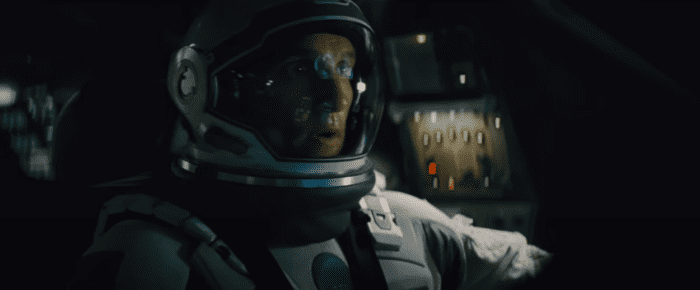 Cooper is piloting a spacecraft through a wormhole in the Christopher Nolan film Interstellar.