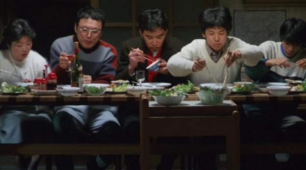 five Japanese people eating facing the camera