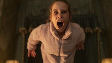 Abigail (Alisha Weir) transforms into a vampire with sharp teeth.