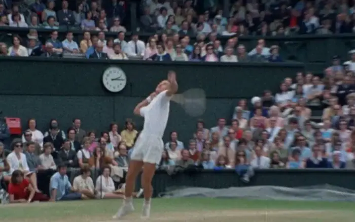 Stan Smith serves at Wimbledon in 1972.