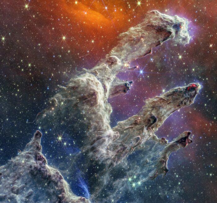 The Pillars of Creation are set off in a kaleidoscope of color in Deep Sky/