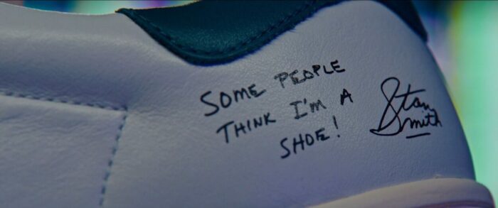 A Stan Smith shoe signed by Smith himself with the words "Some people think I'm a shoe!"