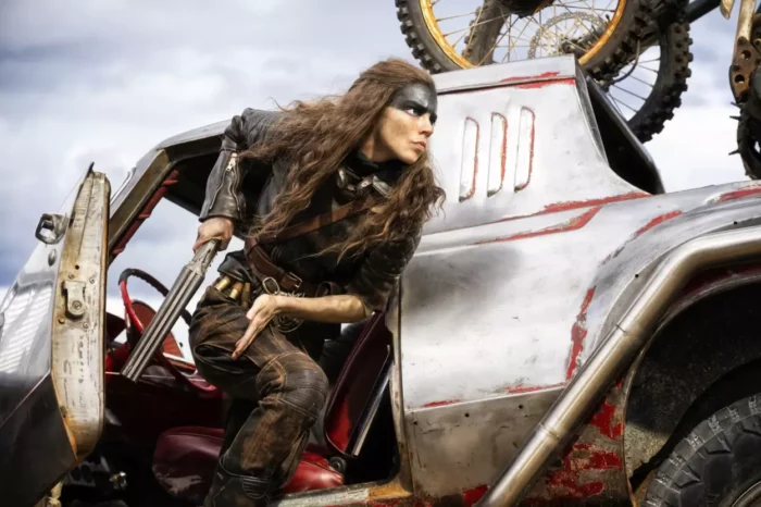 Furiosa climbs out of the War Rig
