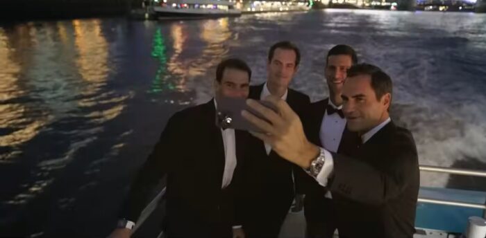 (L-R) Rafael Nadal, Andy Murry, and Novak Djokovic pose as Roger Feder takes a selfie on a boat en route to London's O2 arena.