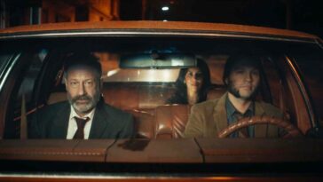 David Duchovny, Stephanie Beatriz, and Logan Marshall-Green as Marty, Mariana, and Ted in Reverse the Curse (2023). Courtesy of Vertical and R&CPMK. The trio are cruising in a car to a hopeful rendezvous with Marty's lost love.