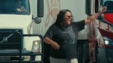 Desiree Wood confronts other truckers in the street.