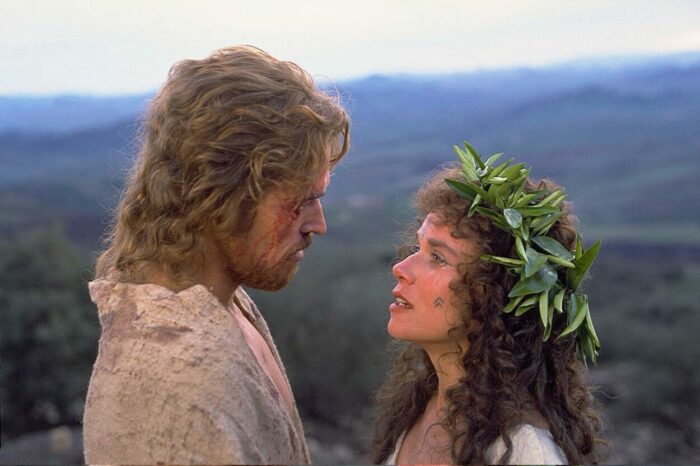 Jesus stands and looks at Mary while in a valley.