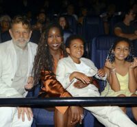 Christian Loubek, Erika Hamilton, and their children Baer and Charley attend a screening of Belief.