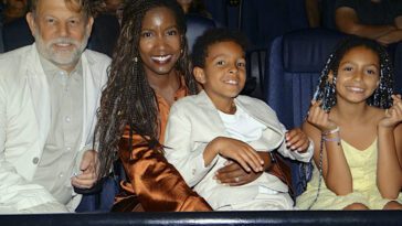 Christian Loubek, Erika Hamilton, and their children Baer and Charley attend a screening of Belief.