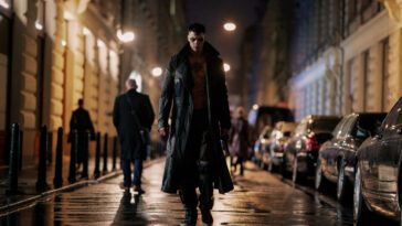 Bill Skarsgård in THE CROW. Photo Credit: Larry Horricks for Lionsgate. The Crow walking the city streets.